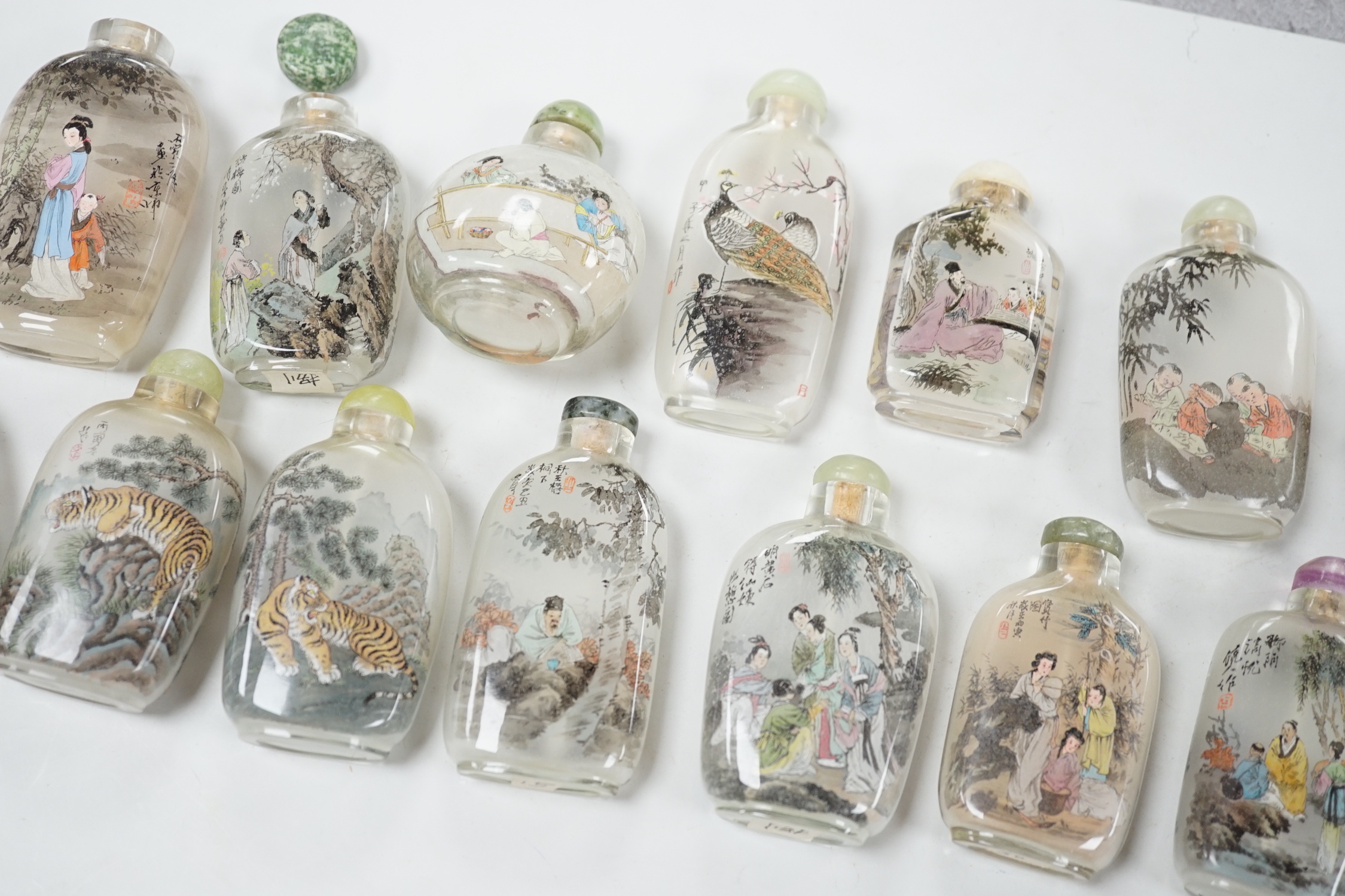 A small collection of Chinese reverse painted bottles